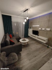 Stylowe mieszkanie w apartamentowcu z balkonem