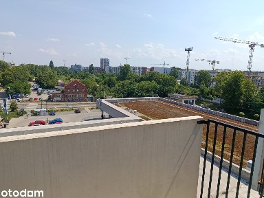 Dwupoziomowe mieszkanie z 2 balkonami i podziemnym miejscem postojowym