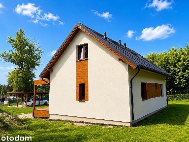 Dom całoroczny 100 m od plaży nad jeziorem Dz. 1699m². Nowa cena.