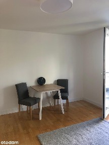 Jasna kawalerka z balkonem i widokiem na zieleń | Powiśle | 27 m²