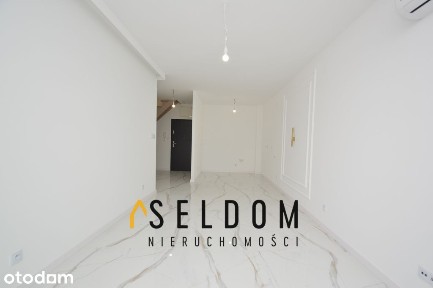 | 85,89 m² | 2 poziomy | balkon | 2 miejsca post.
