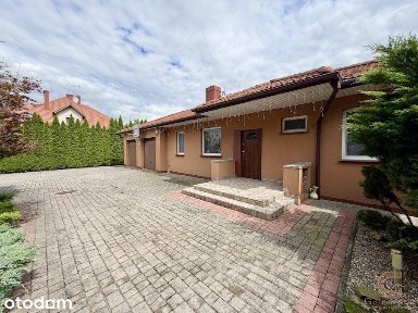 Parterowy dom, garaż 2-stan., działka 1142 m2 Ro