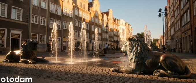 Dwupoziomowy apartament przy Bazylice Mariackiej | Widok z pocztówki