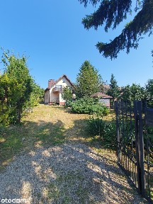 Całoroczny dom z potencjałem w spokojnej okolicy | działka 1100 m2