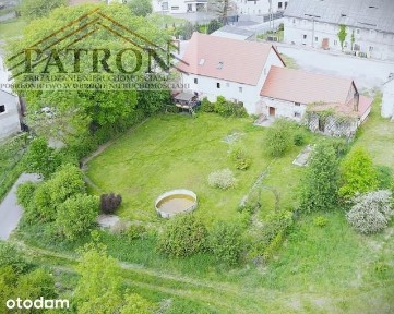 Dom z ogrodem, garażem i powierzchnia usługową