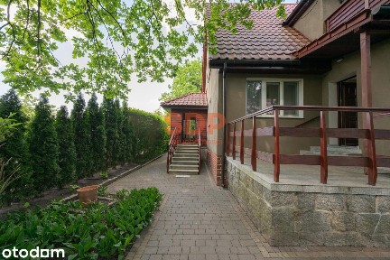 Klimatyczny dom w otoczeniu zieleni, Biskupin 240 m2 / 803 m2