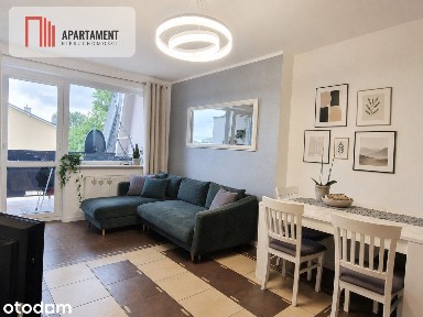 Mieszkanie dwupoziomowe 4-pokoje, balkon i garaż