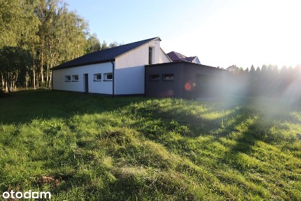 Nowy dom z przestronnym salonem i garażem!