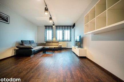 Przestronny i widny apartament z miejscem parkingowym