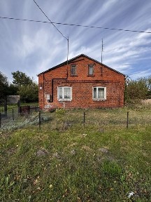 Dom z czerwonej cegły na dużej działce - Szczawin Borowy Kolonia