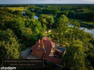 Dom ukryty w zieleni z widokiem na zakole Warty