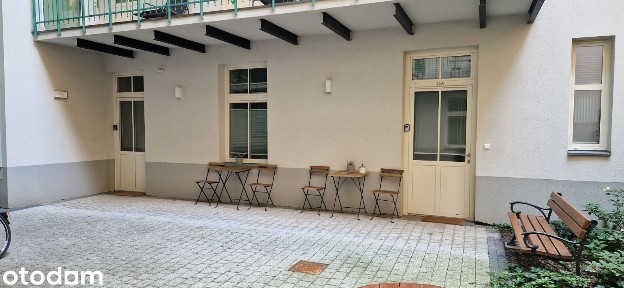 Właściciel sprzeda lokal 15,45m2+5m2 podwórka, parter winda, MPEC.