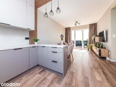 Nowoczesny segment z garażem i ogródkiem 105,09m2