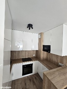 Wynajem 2-pok. mieszkania z balkonem i garażem