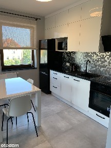 Elegancki apartament z balkonem i miejscem parkingowym