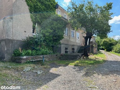 Budynek mieszkalno-usługowy przy DK8