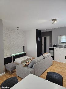 Atrakcyjne mieszkanie z balkonem i garażem