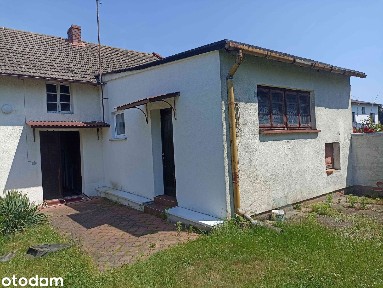 Dom z zabudową gospodarczą