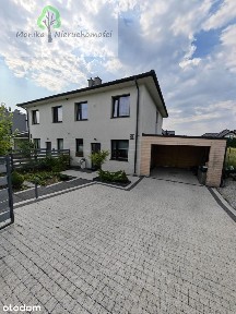 Dom w zabudowie bliźniaczej z pięknym ogrodem - Dą