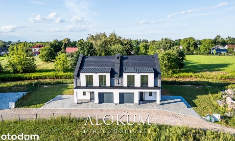 Przestronny i komfortowy dom w zabudowie bliźniaczej, Niepołomice.