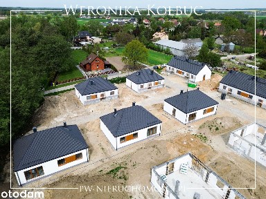 Domy parterowe w zielonej okolicy 3km za Szczodrem.
