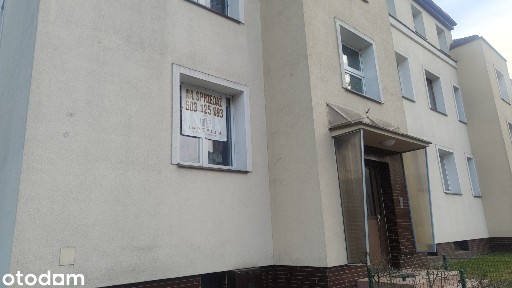 Dwa pokoje z balkonem wysoki parter