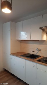 Przestronne mieszkanie dwu pokojowe, kuchnia pow. 59,91 m2 balkon.