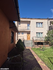 Dom bliźniak z garażem i letnią kuchnią w atrakcyjnej lokalizacji