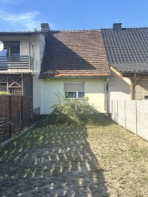 Bezczynszowe mieszkanie 59,9 m² w szeregowcu z działką rolną i zapleczem gospodarczym - Roszkówko (gm. Miejska Górka)