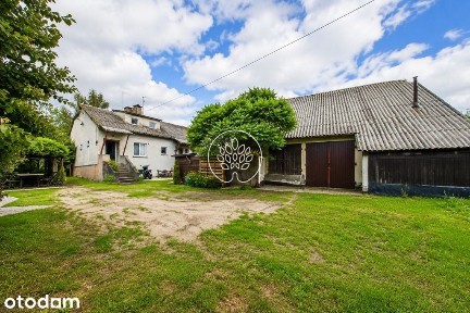 Dom z działką 1100 m² i wysokim garażem