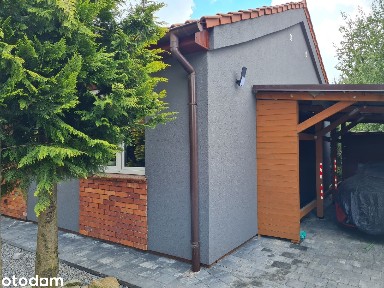 Nietuzinkowy, wolnostojący dom w przepięknej zielonej scenerii
