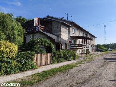 Mieszkanie z budynkiem usługowym i dużą działką