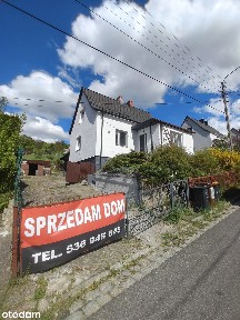 Dom wolnostojący z piwnicą i garażem