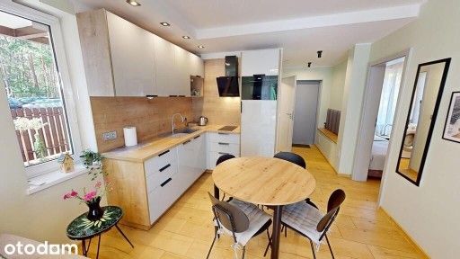 Apartament z dużym ogrodem i miejscem postojowym