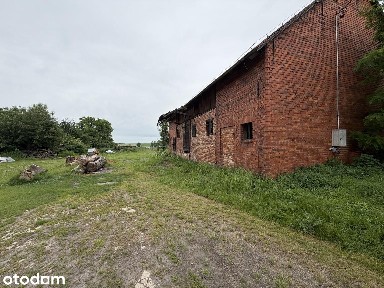 Działka budowlana 13 arów z budynkiem gospodarczym - Ślizów.
