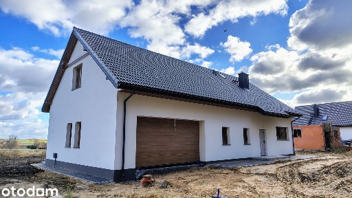 Dom parterowy z garażem i dużą działką