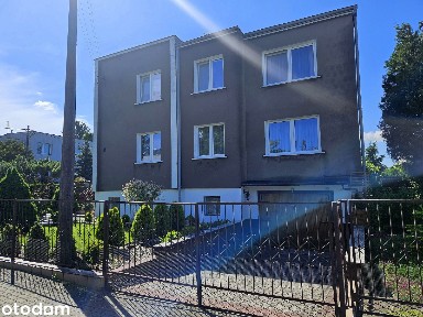 Dom dwupokoleniowy z garażem i uroczym ogrodem blisko centrum - Konin