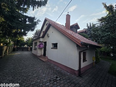 Wyjątkowa posiadłość z pięknym ogrodem i dużym budynkiem gospodarczym