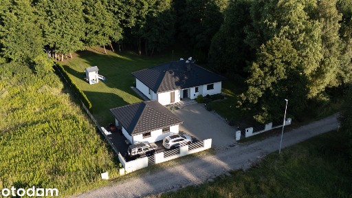 Parterowy dom pod lasem na osiedlu Owczarki