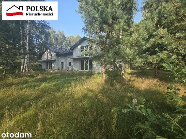 Na sprzedaż nowy dom z dużą działką przy lesie.