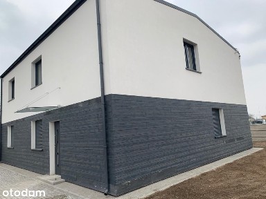 Nowy dom z ogrodem na biuro, salon lub klinikę