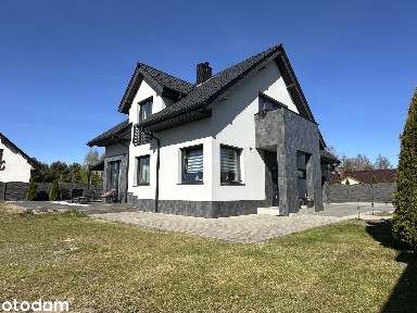 Dom wolnostojący z garażem i ogrodem