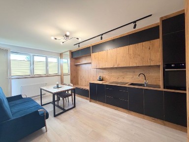 Do wynajęcia M3 z garażem w apartamentowcu Aura Towers