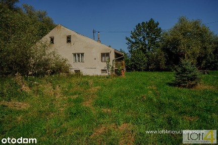 Dom z piękną 70 arową działką w Szczurowej