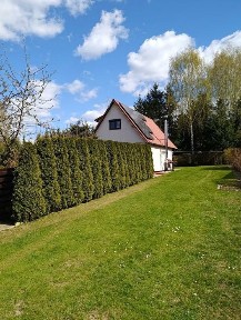 Dom na Mazurach nad jeziorem Bartężek, w miejscowości Winiec.