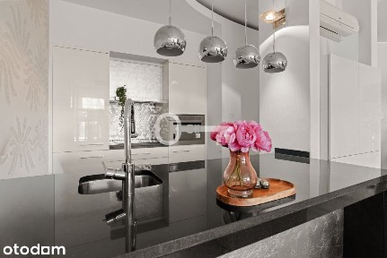 Designerski apartament z basenem i Wartą za oknem