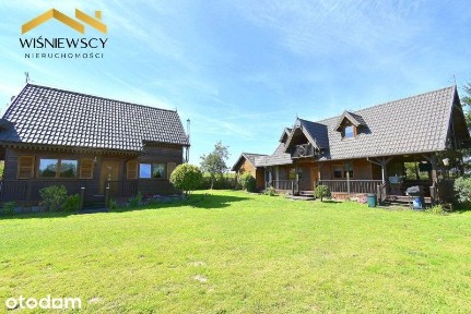 Dwa domy nad stawem, poza wsią, działka 7947 m2