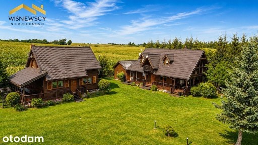Dwa domy nad stawem, poza wsią, działka 7947 m2