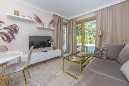 | Dwupokojowy apartament z tarasem | Zamknięte osiedle | Miejsce w parkingowe w hali garażowej |
