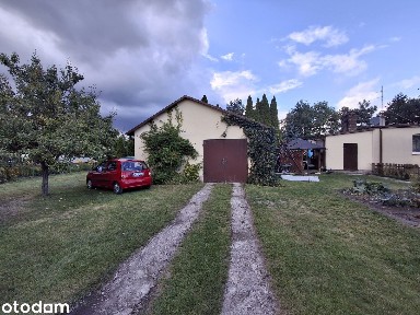 Parterowy dom (bliźniak) 85,6 m² na działce 966 m² z dużym garażem